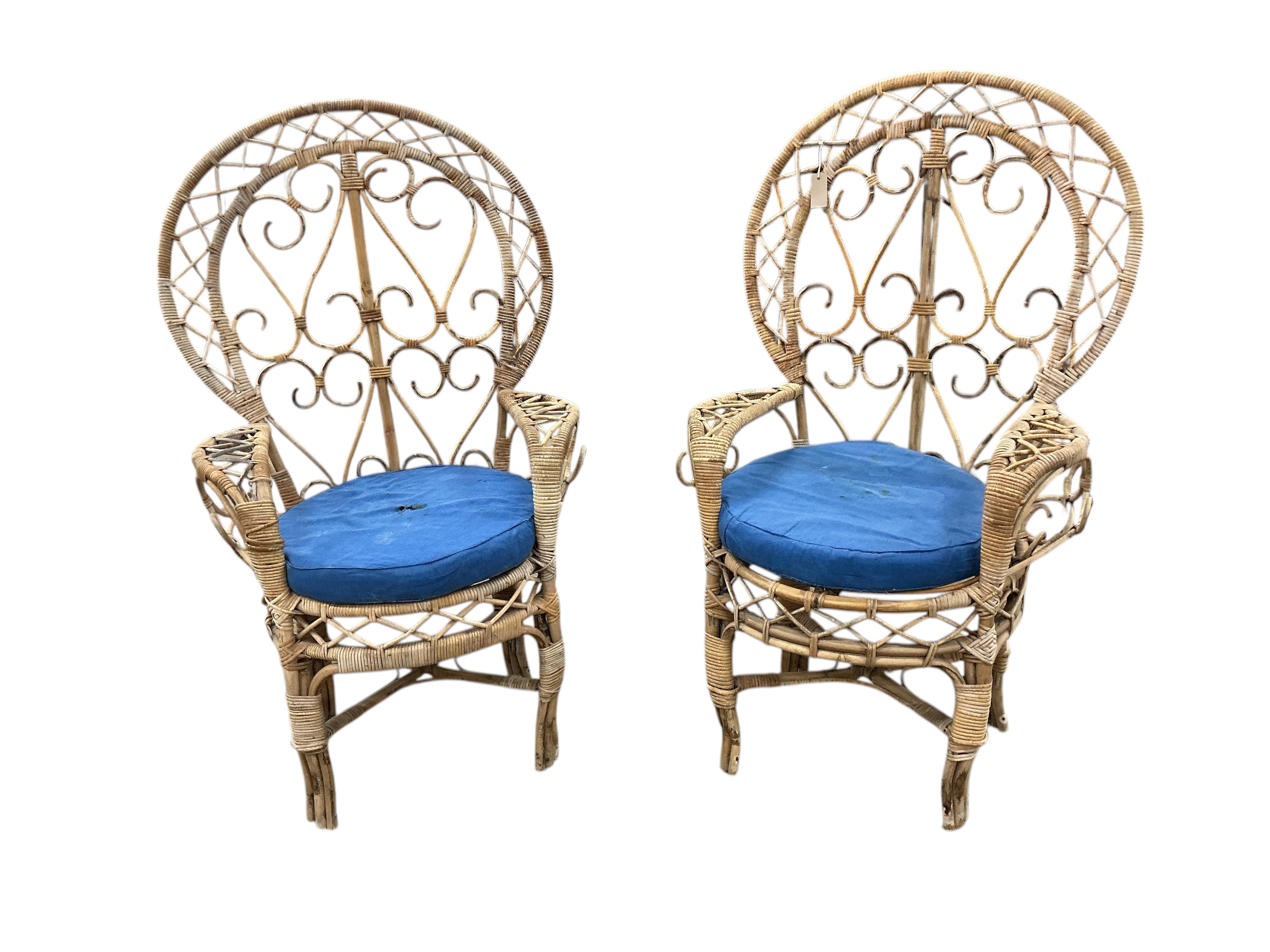 A pair of mid century caned bamboo peacock chairs, width 80cm, depth 56cm, height 134cm
